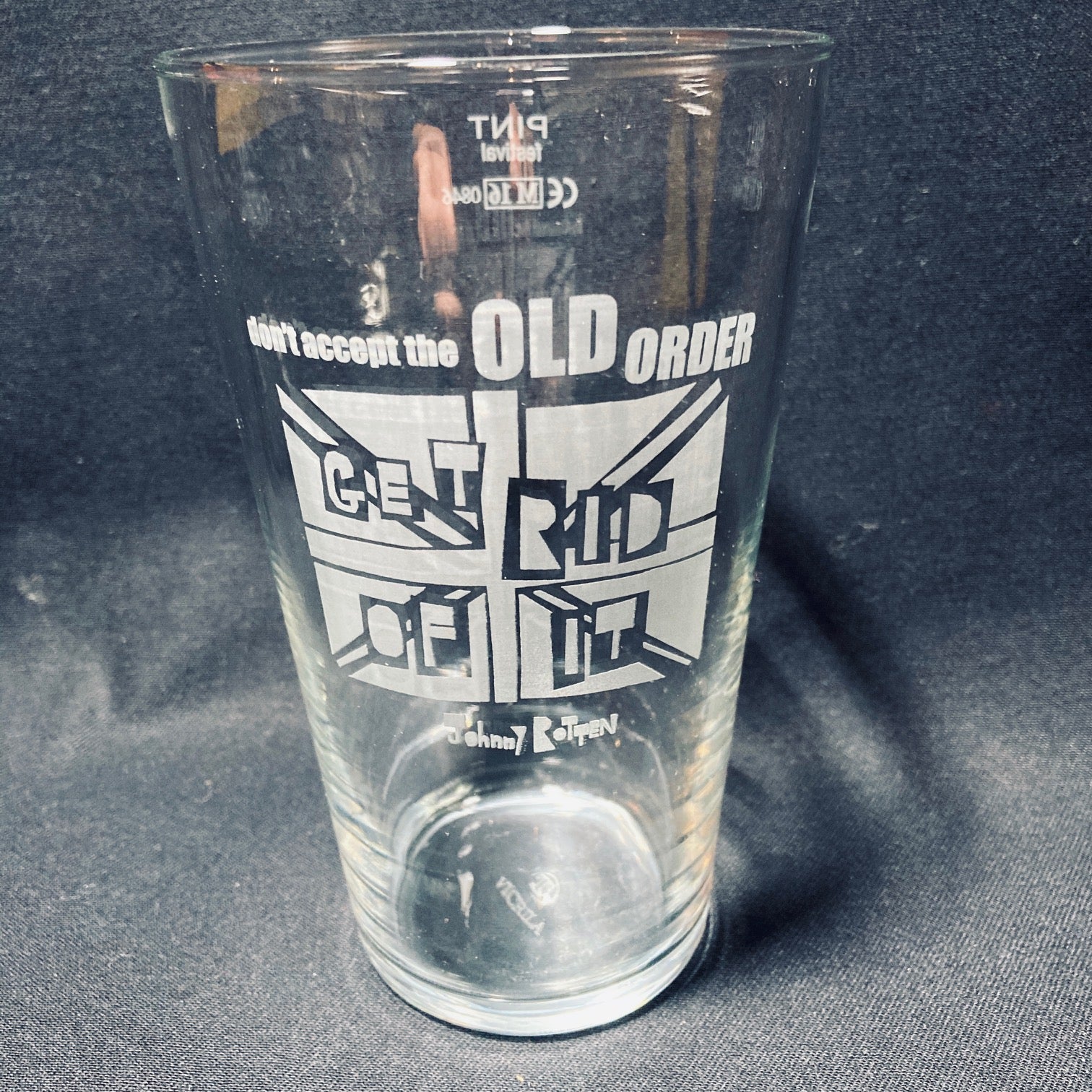 A set of 4 Vinyl Revolution beer glasses featuring a quote from Johnny Rotten