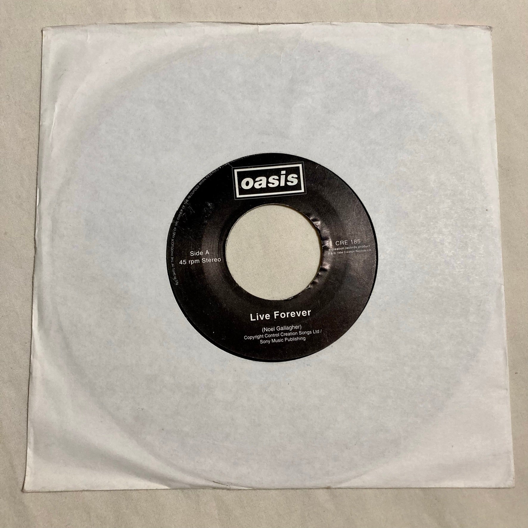 Oasis - Live Forever 7" single (rare Jukebox copy!)
